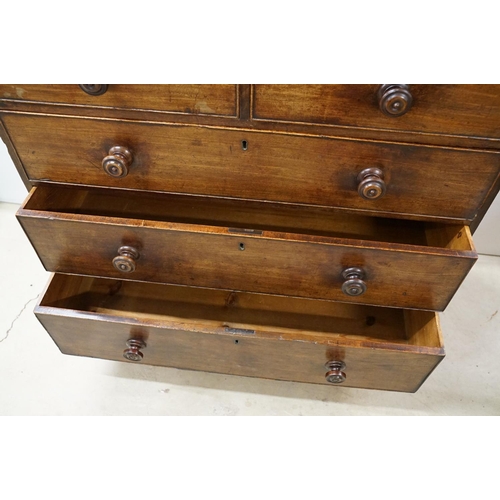 556 - Victorian mahogany chest of two short and three long drawers, with turned handles on turned bun feet... 