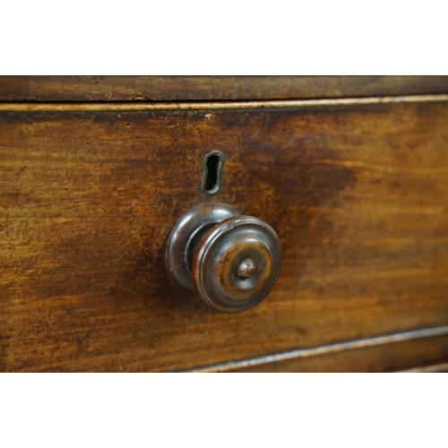 556 - Victorian mahogany chest of two short and three long drawers, with turned handles on turned bun feet... 