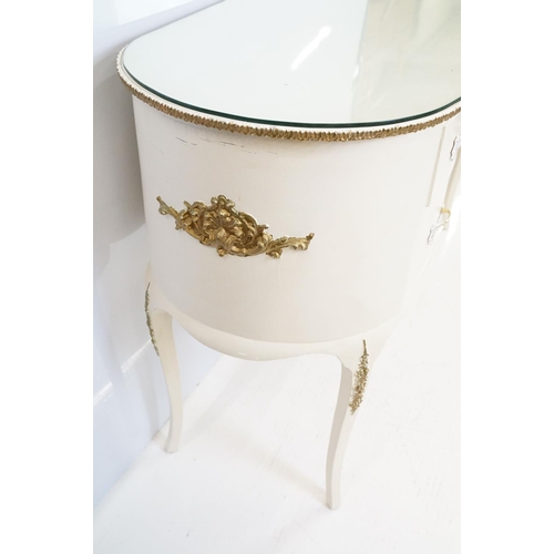 569A - French style white kidney shaped dressing table with gilt trim and an arrangement of five drawers, w... 