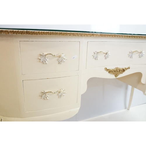 569A - French style white kidney shaped dressing table with gilt trim and an arrangement of five drawers, w... 