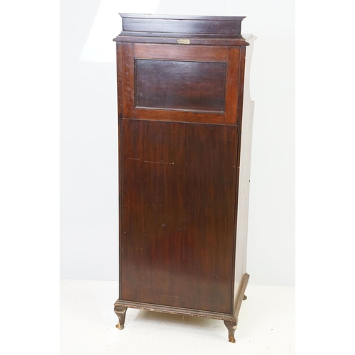 579 - 20th century mahogany music cabinet, with two cupboards below mirrored shelf area, 124cm high x 48cm... 