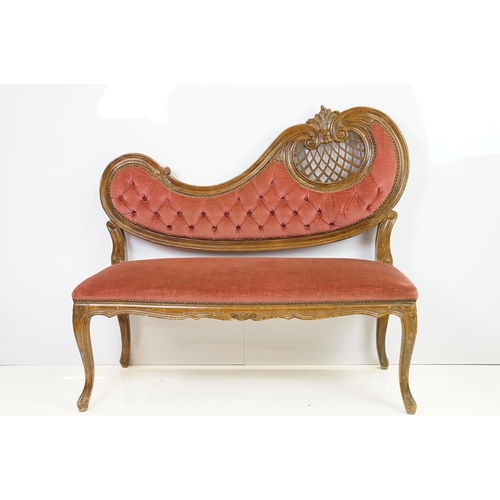 583 - 20th century continental style settee with shaped elaborately pierced back, the button back and seat... 