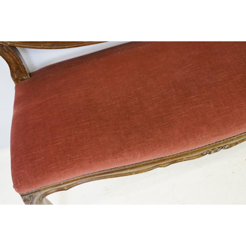 583 - 20th century continental style settee with shaped elaborately pierced back, the button back and seat... 