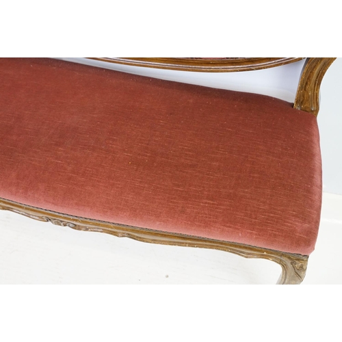 583 - 20th century continental style settee with shaped elaborately pierced back, the button back and seat... 