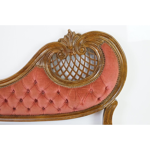 583 - 20th century continental style settee with shaped elaborately pierced back, the button back and seat... 