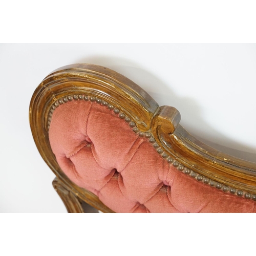 583 - 20th century continental style settee with shaped elaborately pierced back, the button back and seat... 