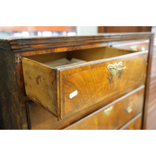 585 - Early 18th century walnut chest of two short over four long drawers on stand, with later bun feet, 9... 