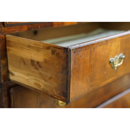 585 - Early 18th century walnut chest of two short over four long drawers on stand, with later bun feet, 9... 