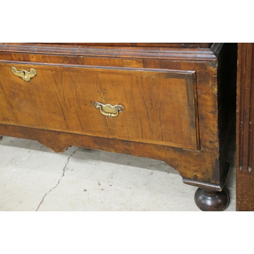 585 - Early 18th century walnut chest of two short over four long drawers on stand, with later bun feet, 9... 