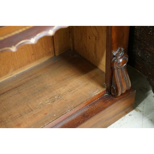 586 - Mahogany bookcase of five shelves, with cut leather gilt embossed fringes, 180cm high x 135cm wide x... 