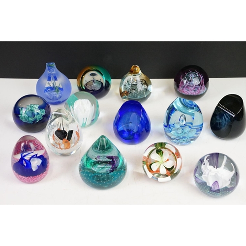 103 - Collection of Caithness paperweights including some limited edition examples. The lot to include Gau... 
