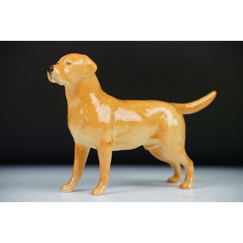 91 - Collection of ceramic ornaments to include two Beswick labradores, fox and a calf, a Royal Doulton a... 