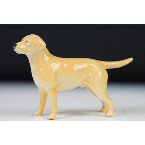 91 - Collection of ceramic ornaments to include two Beswick labradores, fox and a calf, a Royal Doulton a... 