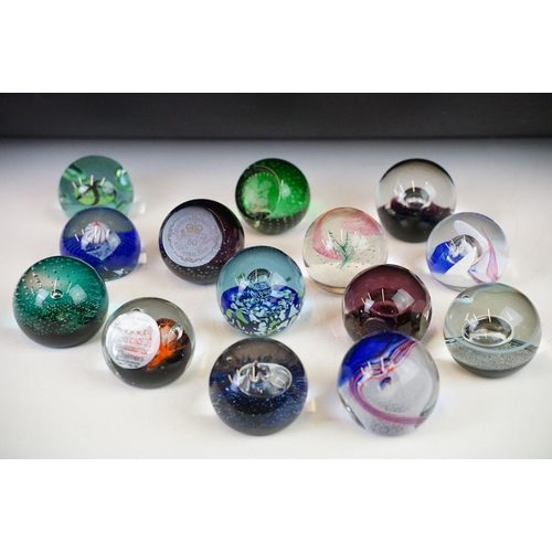 93 - Collection of Caithness paperweights including limited edition examples. Lot to include Merry Go Rou... 
