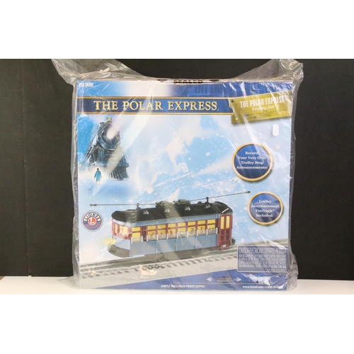 18 - Two boxed Lionel O gauge Christmas related train sets to include The Polar Express 1923130 and The T... 