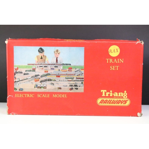 20 - Four boxed Triang OO gauge train sets to include RS4, RS62 Car-A-Belle (missing 3 x cars), RS14 and ... 