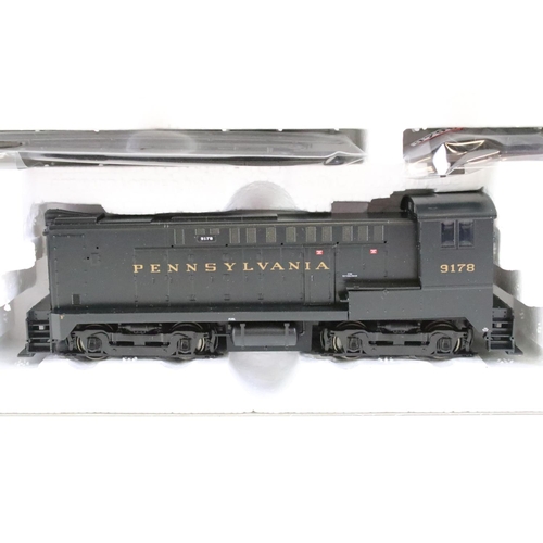 53 - Three boxed Stewart Hobbies HO gauge locomotives to include 6601 Baldwin AS-616 Penn #8966, 7207 GE ... 
