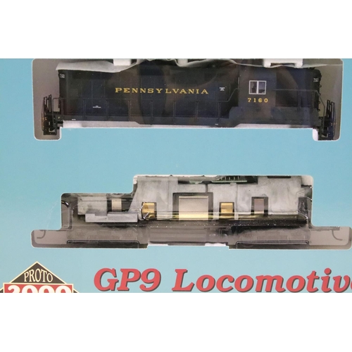 57 - Five boxed Proto Series 2000 HO gauge locomotives to include 23618 GP9 II PPR 7020, 21666 PA Locomot... 