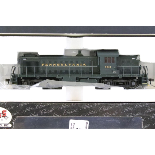 58 - Two boxed Altas Classic HO gauge locomotives to include 8866 ALCO RS-1 Penn #5621 and 9378 C-425 Loc... 