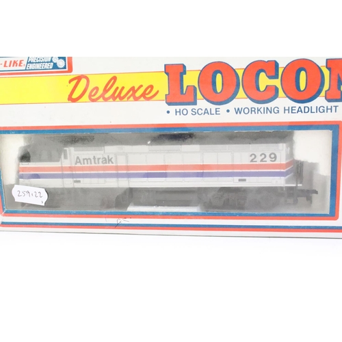 63 - Boxed Life Like HO gauge Deluxe Locomotive plus a boxed Rivarossi RT600227 60' HWT Passenger Car Set... 