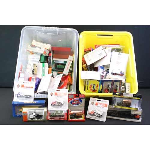 69 - Large collection of boxed / carded HO/OO gauge plastic & diecast trackside model vehicles to include... 
