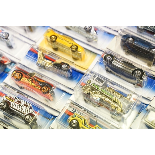 1015 - Around 69 carded Mattel Hot Wheels diecast models, appearing vg and some ex