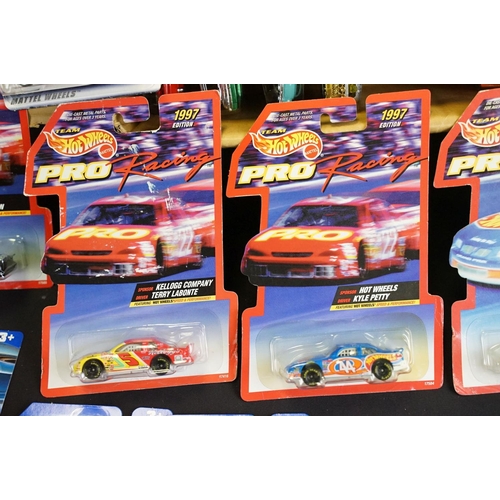 1017 - Around 84 carded Mattel Hot Wheels diecast models featuring Pro Racing 1997 Editions, appearing vg a... 