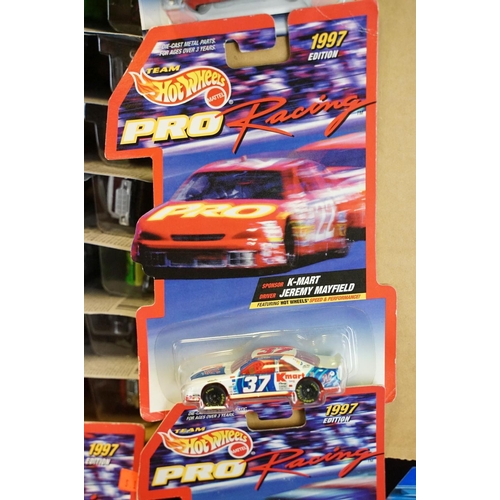 1017 - Around 84 carded Mattel Hot Wheels diecast models featuring Pro Racing 1997 Editions, appearing vg a... 