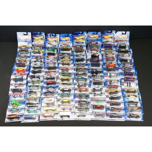 1031 - Around 130 carded Mattel Hot Wheels diecast models, appearing vg and some ex