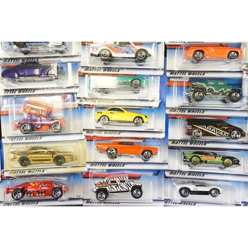 1031 - Around 130 carded Mattel Hot Wheels diecast models, appearing vg and some ex