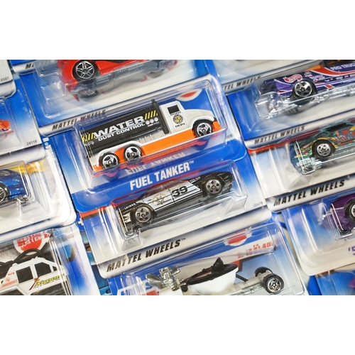 1031 - Around 130 carded Mattel Hot Wheels diecast models, appearing vg and some ex