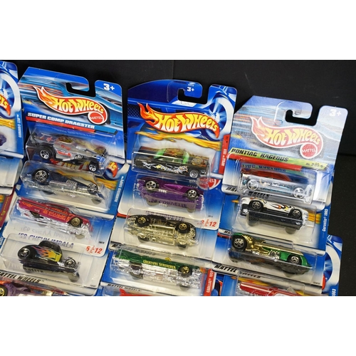 1031 - Around 130 carded Mattel Hot Wheels diecast models, appearing vg and some ex