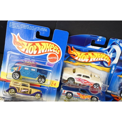 1031 - Around 130 carded Mattel Hot Wheels diecast models, appearing vg and some ex