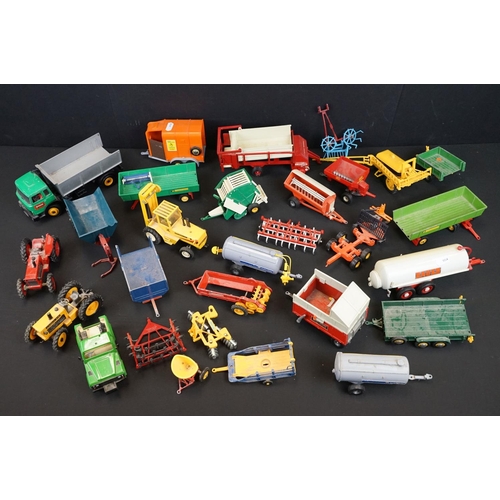 1044 - Collection of around 26 Britains farming related diecast models to include Hay Baler, Volvo BM in re... 