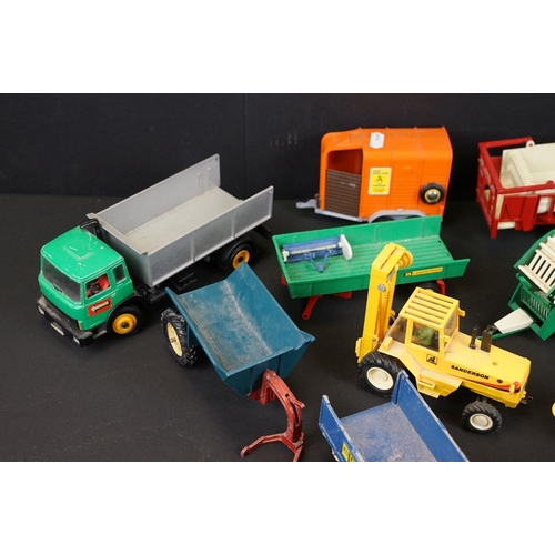 1044 - Collection of around 26 Britains farming related diecast models to include Hay Baler, Volvo BM in re... 