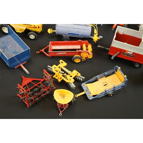 1044 - Collection of around 26 Britains farming related diecast models to include Hay Baler, Volvo BM in re... 