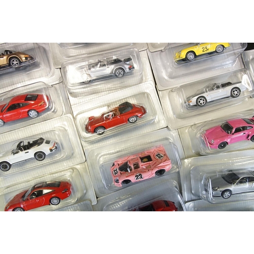 1051 - Collection of 50 1/43 scale boxed / cased DeAgostini Porsche diecast models, in clear cases and card... 