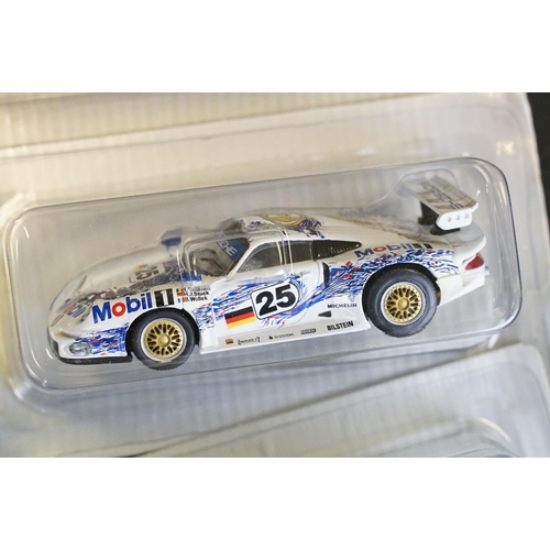 1051 - Collection of 50 1/43 scale boxed / cased DeAgostini Porsche diecast models, in clear cases and card... 