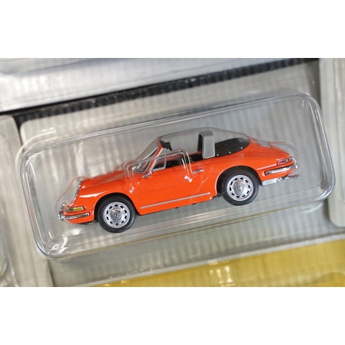 1051 - Collection of 50 1/43 scale boxed / cased DeAgostini Porsche diecast models, in clear cases and card... 