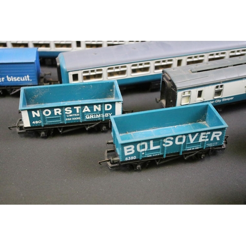 192 - 68 OO gauge items of rolling stock, mainly Hornby & Triang examples featuring tankers, wagons, vans ... 
