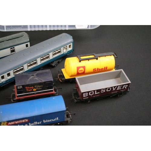 192 - 68 OO gauge items of rolling stock, mainly Hornby & Triang examples featuring tankers, wagons, vans ... 