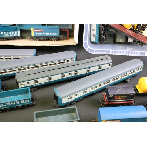 192 - 68 OO gauge items of rolling stock, mainly Hornby & Triang examples featuring tankers, wagons, vans ... 