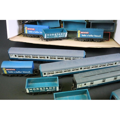 192 - 68 OO gauge items of rolling stock, mainly Hornby & Triang examples featuring tankers, wagons, vans ... 