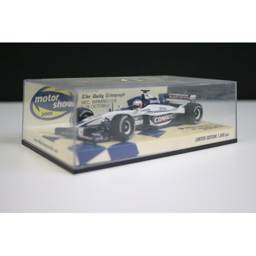 1073 - Collection of four boxed / cased Paul's Model Art Minichamps racing car diecast models to include lt... 