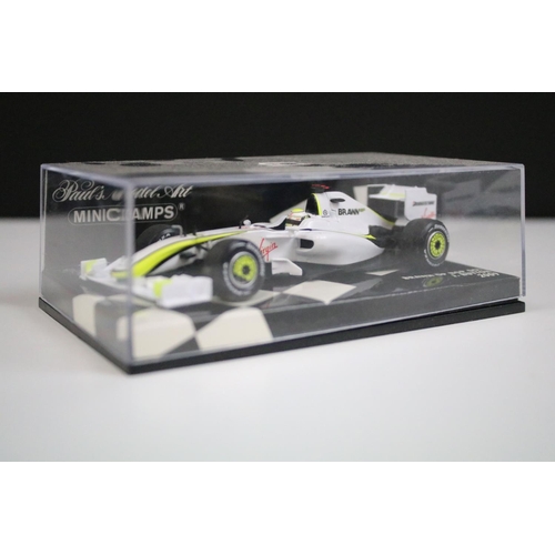 1073 - Collection of four boxed / cased Paul's Model Art Minichamps racing car diecast models to include lt... 