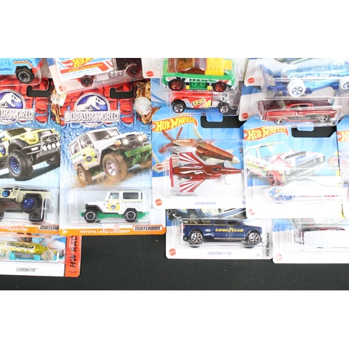 1179 - Hot Wheels - 90 Carded Hot Wheels diecast models featuring Motor Cycles, DC Universe, Angry Birds, B... 