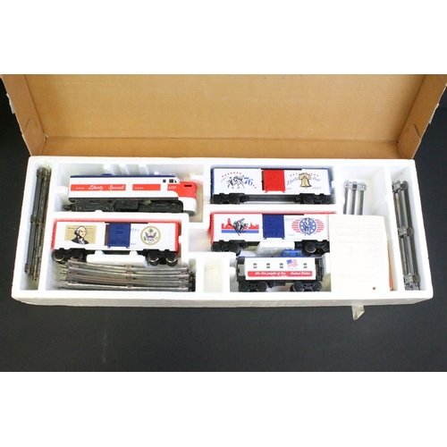 124 - Boxed Lionel O gauge 6-11721 Mickey's World Tour Train Set, appearing complete and vg and a boxed lt... 