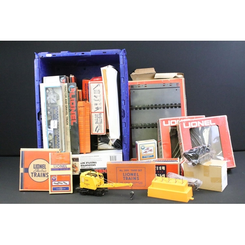 143 - Collection of Lionel O gauge model railway to include 2 x boxed Graduated Trestle Set, boxed Tractor... 