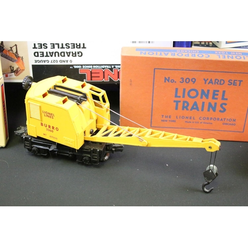 143 - Collection of Lionel O gauge model railway to include 2 x boxed Graduated Trestle Set, boxed Tractor... 