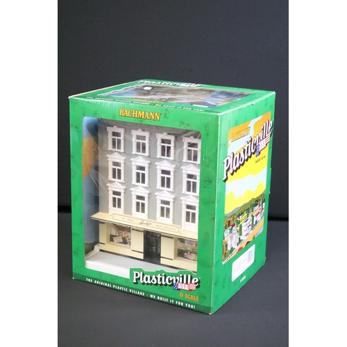 147 - Four boxed O gauge trackside models to include 2 x Bachmann Plasticville (45315 Apartment Building &... 